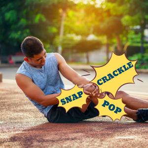 What causes crackling or popping noises in the knee?
